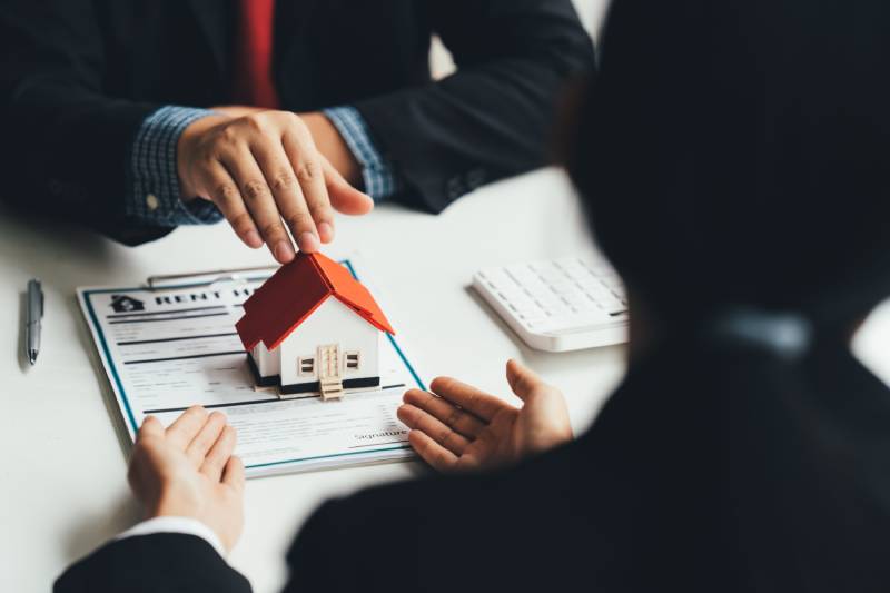 Property insurance advisor explaining coverage to landlord 