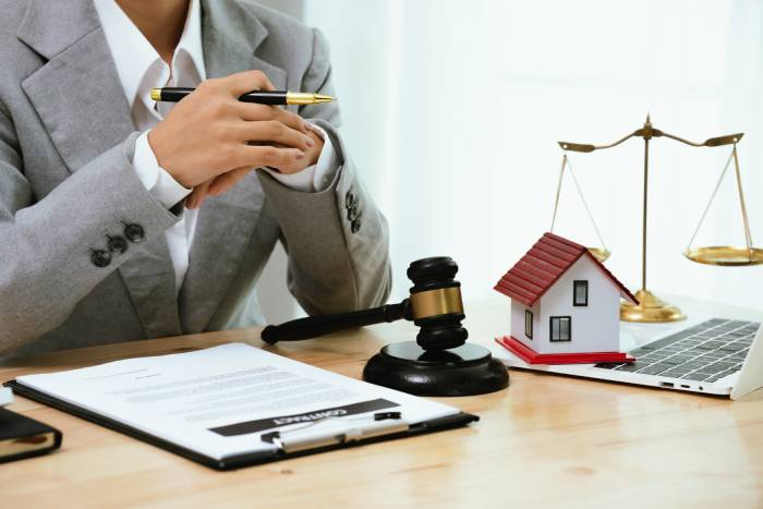 Rental property keys and house model representing secure property investment in London