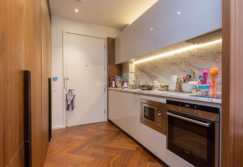 Kitchen view of Embassy Gardens Image 1